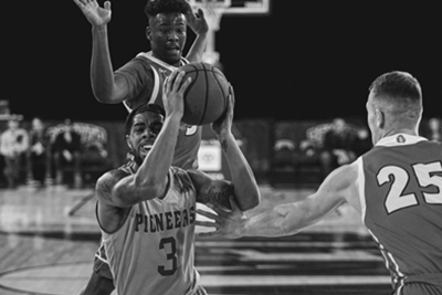 basketball player shooting a ball